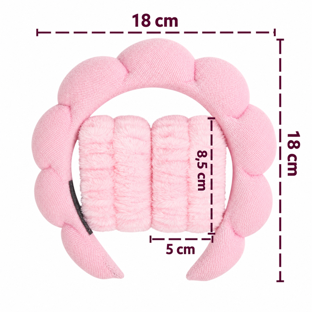 Ljusrosa pannband och armband med måttangivelser