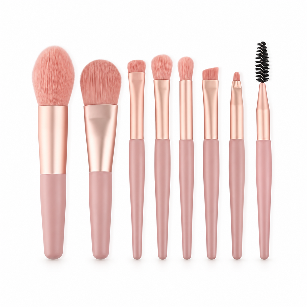 Rosa set med 8 makeupborstar uppställda bredvid varandra
