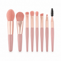 Rosa set med 8 makeupborstar uppställda bredvid varandra